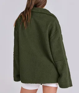 Back view of a warm dark green oversized sherpa teddy coat for women winter fashion