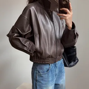 Vintage brown oversized PU leather motorcycle jacket for women, stylish autumn outfit