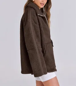 Detailed side view of a cozy oversized brown teddy fleece jacket for women winter wear
