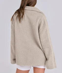 Back view of warm oversized women's fleece teddy jacket showing thick plush texture.