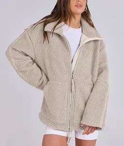Cozy oatmeal fleece teddy jacket with double zipper and oversized fit for winter warmth