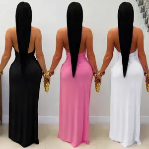 Back view of three sexy halter backless maxi dresses in black, pink, and white colors