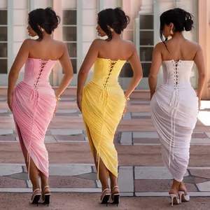 Detailed back view showing lace-up corset and ruched fabric of three sexy strapless dresses.