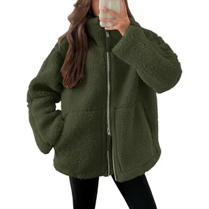 Warm oversized green teddy fleece jacket for women featuring a functional dual zipper