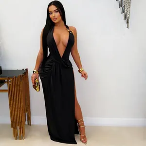 Detail of a sexy black deep V halter backless bodycon maxi dress with a high slit