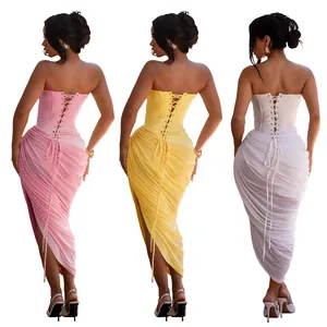 Rear view detail of three sexy ruched bodycon maxi dresses with corset lace-up backs.