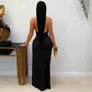 Elegant backless halter bodycon maxi dress in black for a sexy formal evening look.