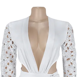 Detail view of sexy deep V-neck white dress featuring intricate floral lace mesh sleeves