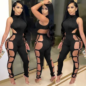 Sexy black cut-out jumpsuit with metal ring details shown from three different angles
