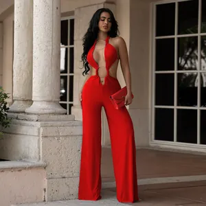 Full view of red sexy cutout halter jumpsuit with wide leg design and ring details.