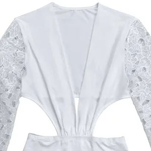 Close-up of white sexy deep V-neck dress featuring floral lace sleeves and cutout detail