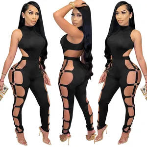 Sexy black hollow-out jumpsuit with side ring details and backless design for nightclub wear.