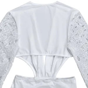 Detailed view of sexy white dress featuring intricate floral lace sleeves and waist cutout.