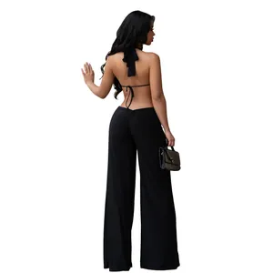Detailed back view of a sexy black halter backless jumpsuit with wide legs