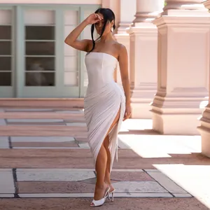 Elegant white strapless ruched bodycon dress with high thigh slit detail