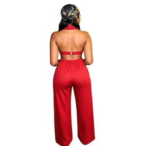 Red two-piece fashion set with halter backless top and wide-leg trousers back view