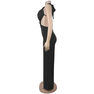Side view of a sexy black halter neck backless bodycon jumpsuit on a mannequin