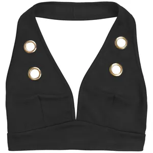 Detail of a black halter top featuring decorative gold metal grommets and deep V-neck