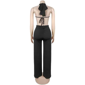 Back view of a sexy black halter backless jumpsuit with tie-back detailing for women
