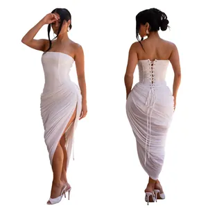 Front and back view of sexy white strapless ruched maxi dress with high slit and lace-up back.