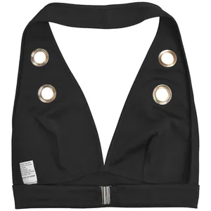 Detail of black halter neck crop top with large metal grommets and deep V-neckline