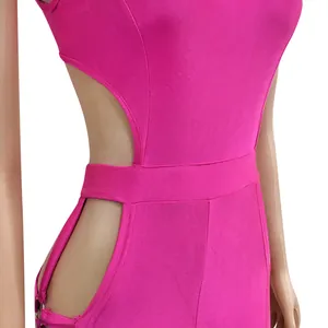 Detailed close-up view of the sexy side cut-out on a bright pink bodycon jumpsuit.