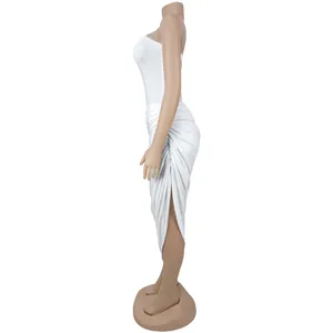 Side profile of a white strapless ruched bodycon midi dress featuring a high side slit