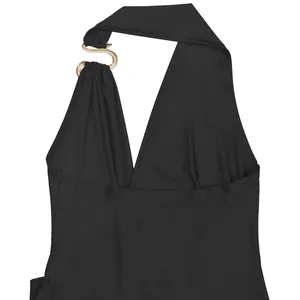 Close-up detail of sexy black deep V-neck halter dress with gold snake-shaped hardware.