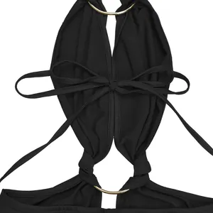 Close-up of black sexy bodysuit with gold ring hardware and tie-back bow detail
