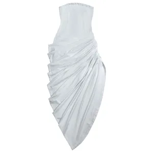 Detail view of white strapless ruched bodycon dress with asymmetrical hemline