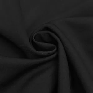 Close-up of high-quality black breathable knit fabric for women's wide-leg trousers