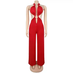 Front view of sexy red backless jumpsuit with cut-out and ring details on mannequin