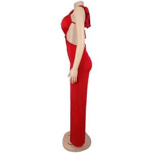 Side view of a sexy red backless jumpsuit featuring a halter tie and bodycon fit.