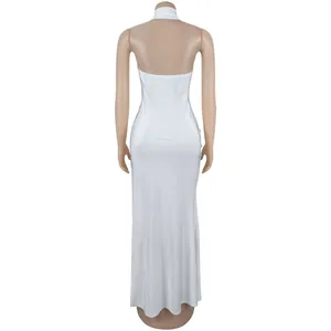 Rear view showing details of elegant white halter neck backless bodycon maxi dress