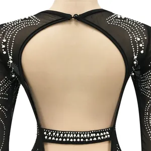 Close-up view of back detail on black mesh dress with pearl and rhinestone accents