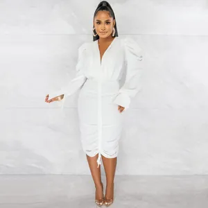 Detailed view of elegant white ruched V-neck long sleeve bodycon dress for women