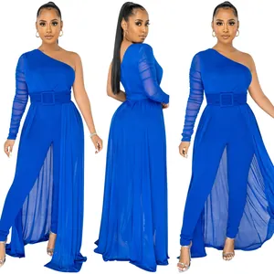 Detail view of royal blue one-shoulder jumpsuit with mesh sleeve and long drape