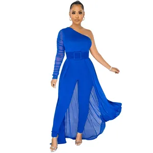 Elegant royal blue one-shoulder jumpsuit with sheer mesh sleeve and long flowing train