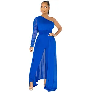 Detailed view of royal blue one-shoulder jumpsuit with sheer mesh overlay and belt