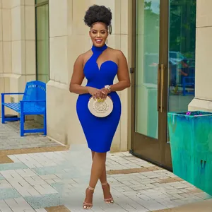 Elegant royal blue halter neck bodycon midi dress with a stylish cutout neckline