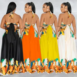 Back view of colorful contrast tie-back halter maxi dress in multiple colors