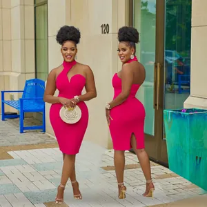 Front and back detail of pink halter off-shoulder bodycon midi dress with slit