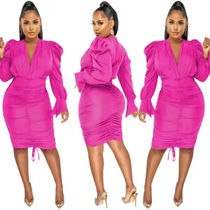 Front and back views of a fuchsia long sleeve ruched V-neck mini dress with puff sleeves