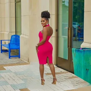 Stylish fuchsia halter neck sleeveless bodycon midi dress with back slit detail