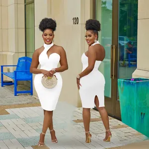 Fashionable white halter neck bodycon midi dress featuring a stylish chest cutout detail