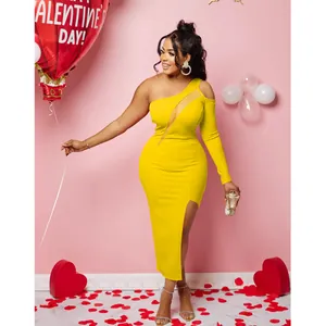 Front view of yellow one-shoulder dress featuring sexy mesh cutout and thigh-high slit