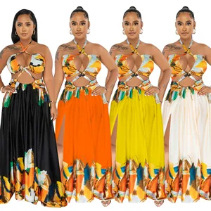 Set of colorful halter neck maxi dresses with cut-out waist and vibrant art print