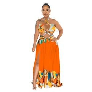 Vibrant orange color block halter maxi dress with high slit and cut-out waist