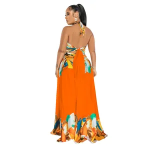 Back view of a vibrant orange halter maxi dress with multicolored print details and tie back