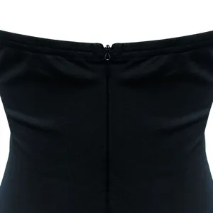 High-quality close-up showing the invisible back zipper and stitching of a black dress